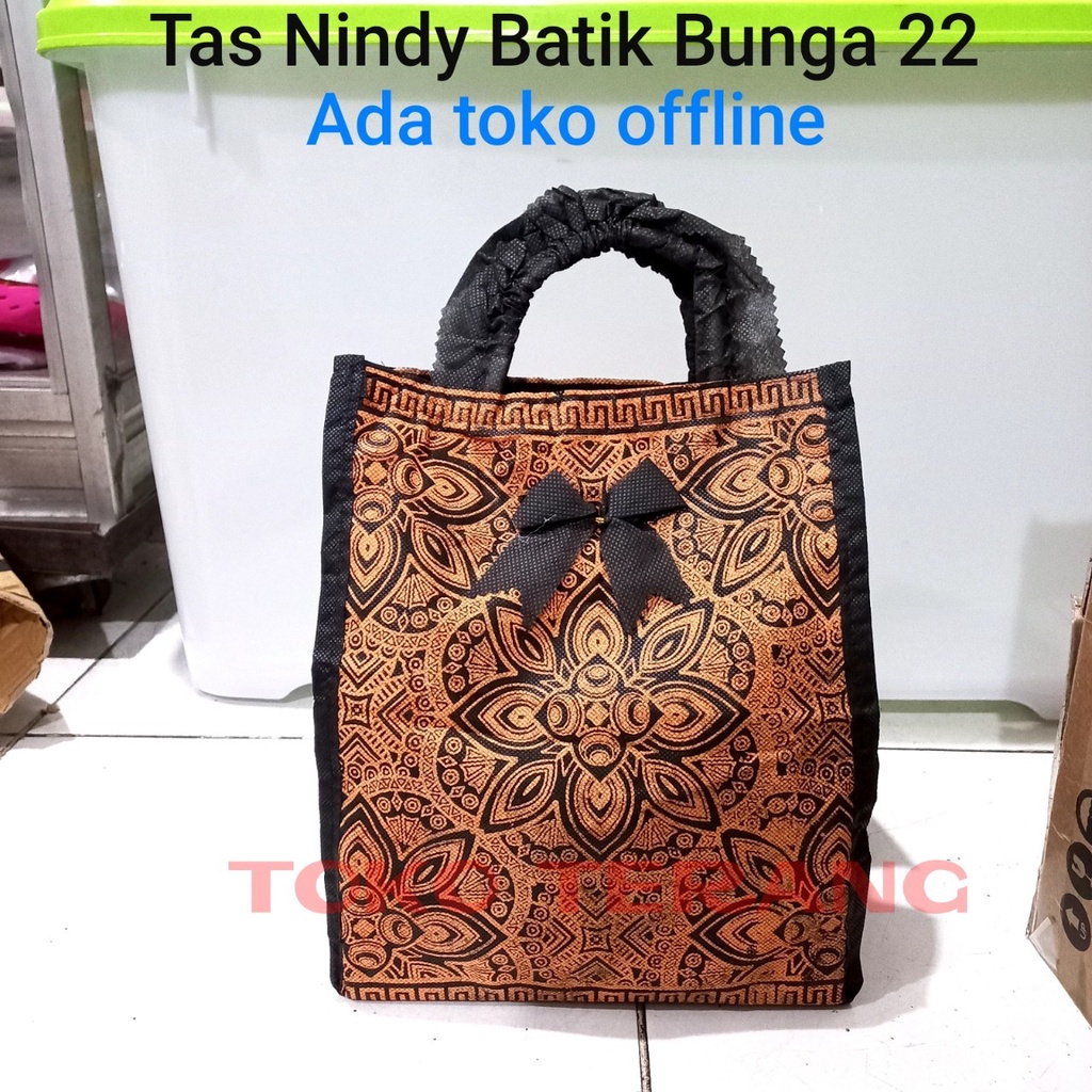 

tas hajatan spunbond nindy batik bunga 22 lusinan