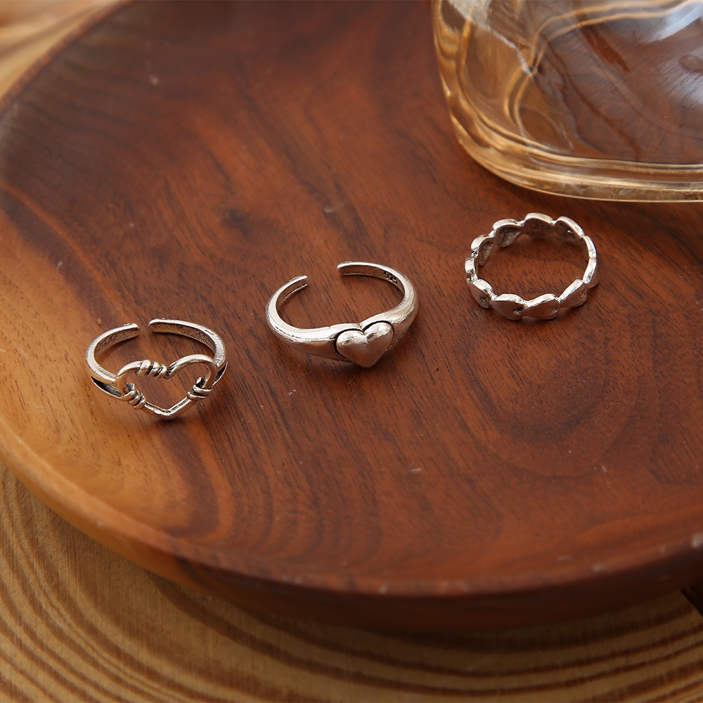 3pcs / Set Cincin Model Hollow Out Bentuk Hati Warna Silver Untuk Wanita