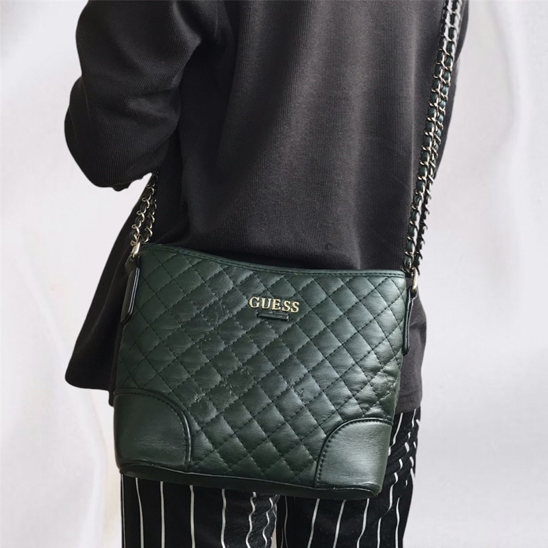 GUESS                                                       sling bag                               