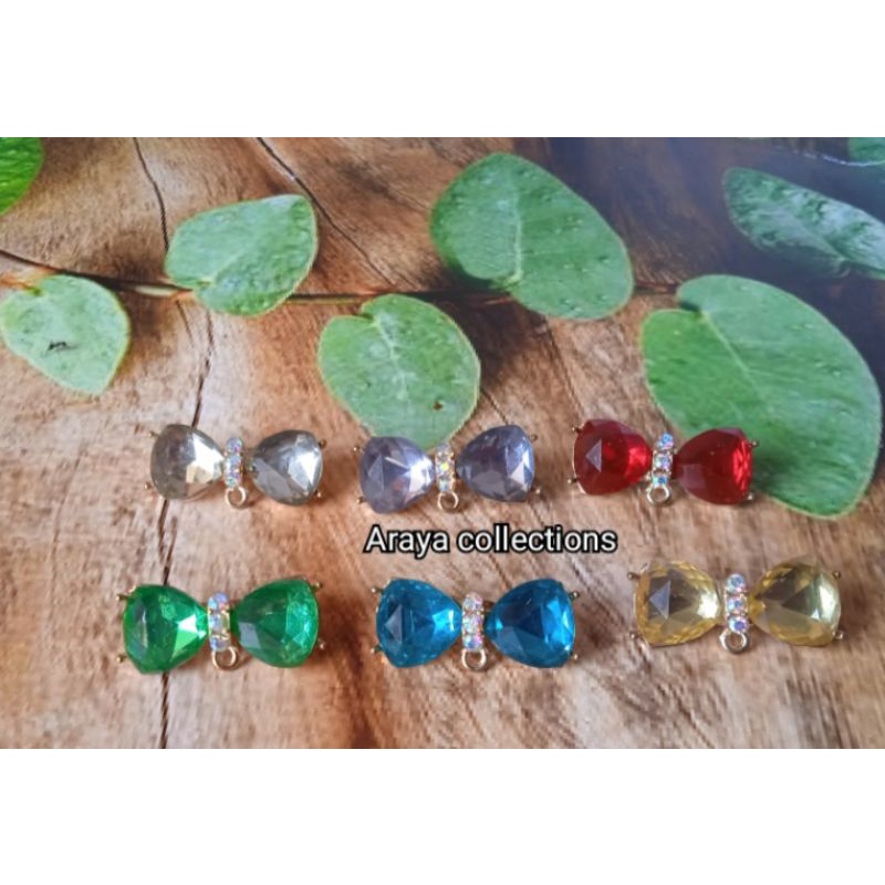 Bros dagu kristal kepala bros mini