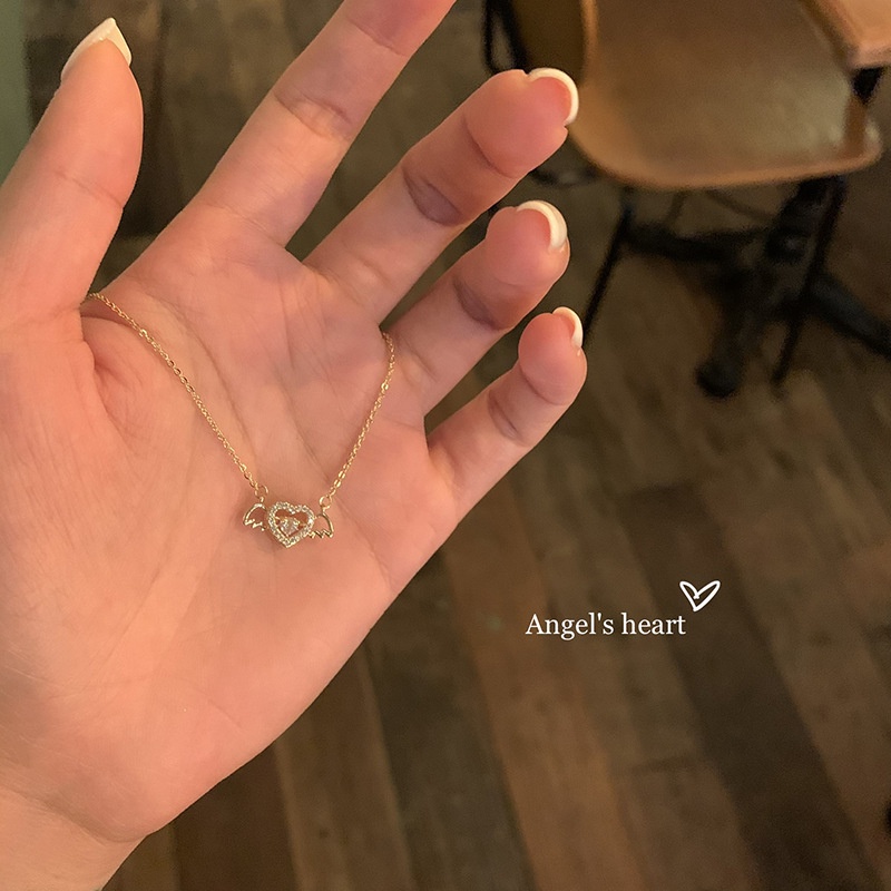 Kalung Rantai Choker Liontin Hati Sayap Aksen Kristal Warna Silver Untuk Wanita