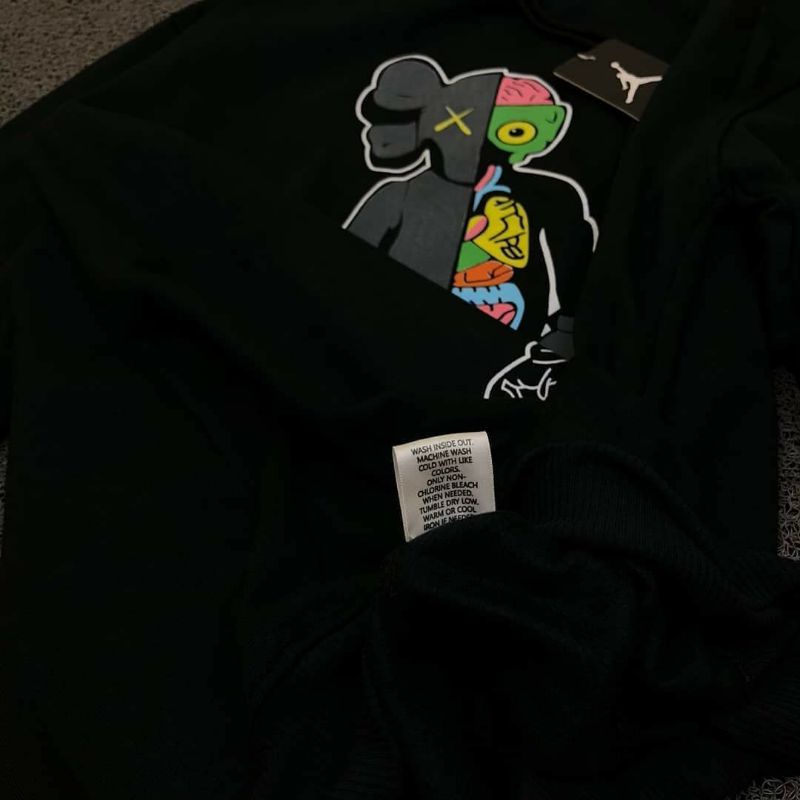 ASTROB.ID-Jaket HOODIE UNIQLO X JORDAN KAWS ANATOMI HITAM/ASTROB.ID/UNIQLO X JORDAN HOODIE TERBARU ORIGINAL PREMIUM FULL TAG+ LEBEL/HOODIE PRIA WANITA TERBARU TERHITS TERLARIS SIZE M-L-XL