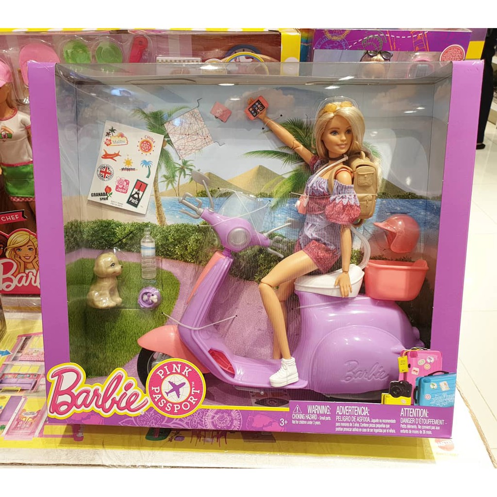 barbie pink passport travel doll with scooter