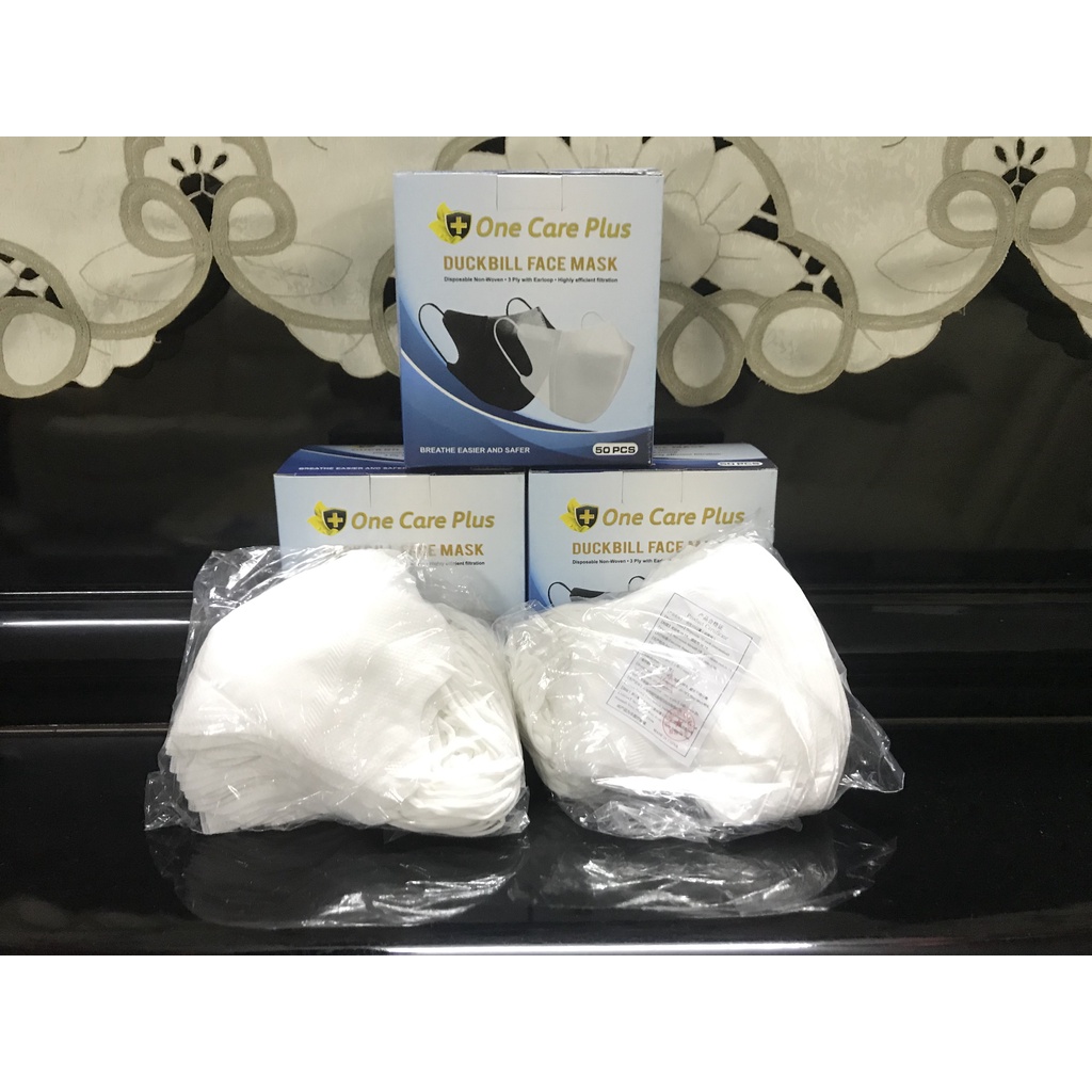 Masker Duckbill One Care Plus Putih Dewasa 1 Box Isi 50 Pcs