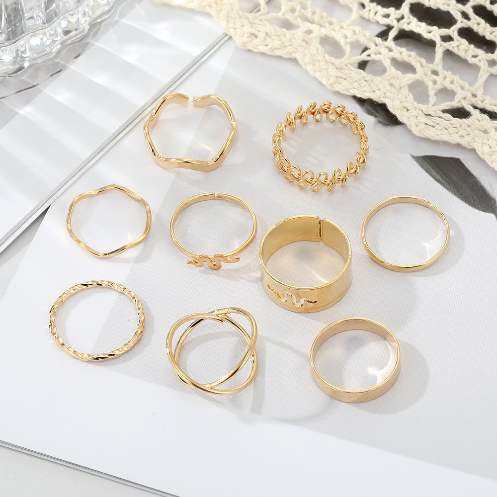 9 Pcs / set Cincin Logam Pola Ular Geometris Model Rongga Untuk Wanita