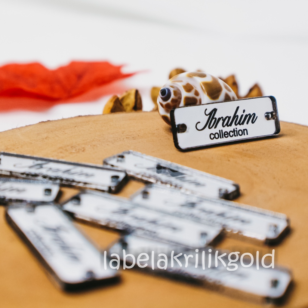 

label hijab | label baju | label akrilik | custom label | label jilbab | label cutting | label cantik