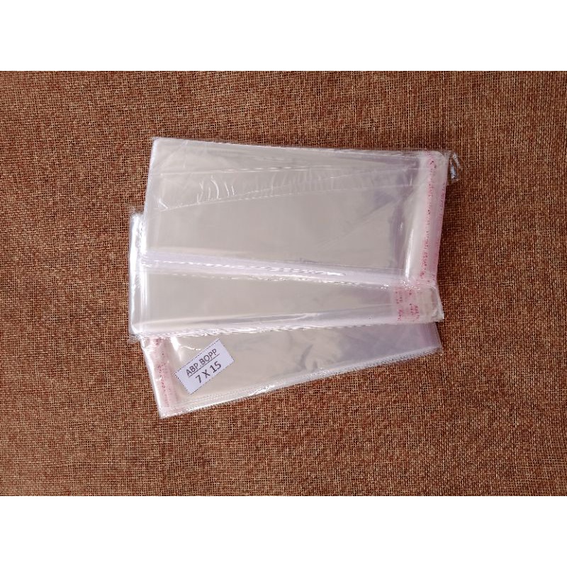 PLASTIK UANG PEREKAT / PLASTIK OPP 7 X 15CM