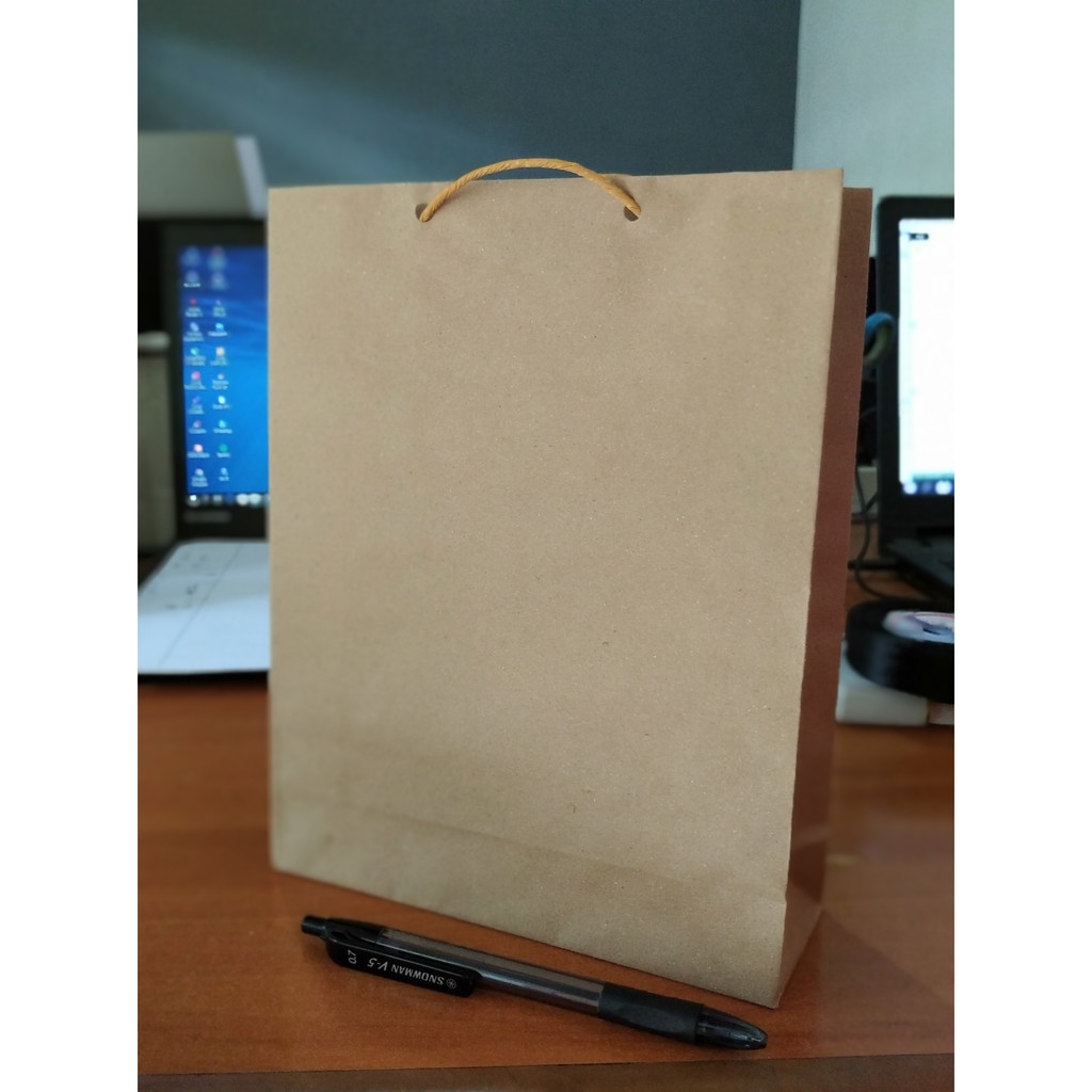 

Paperbag craft coklat Polos 18 x 6 x 23
