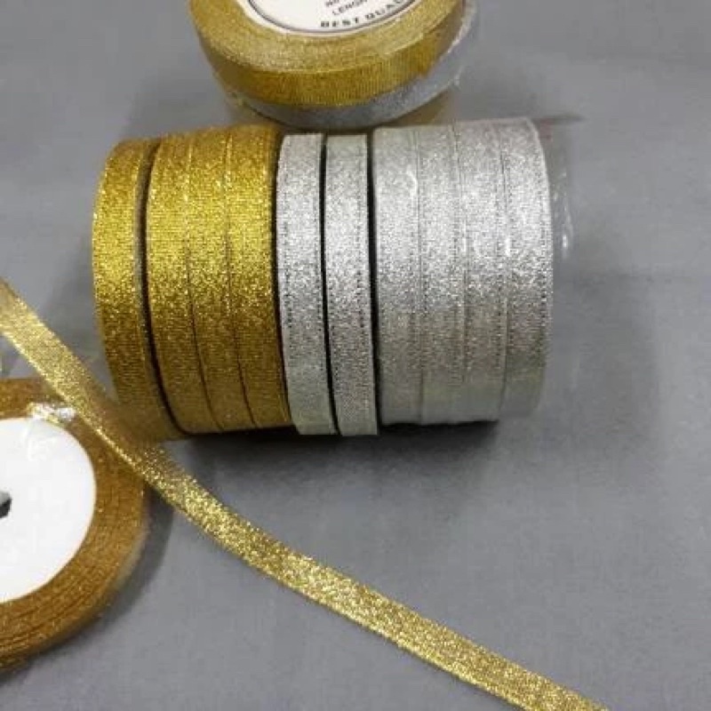 

PITA GLITTER (GOLD/SILVER) 3/8 inc (1 cm) pnjng 20 yard kuranglbih 15-18 mtr /roll