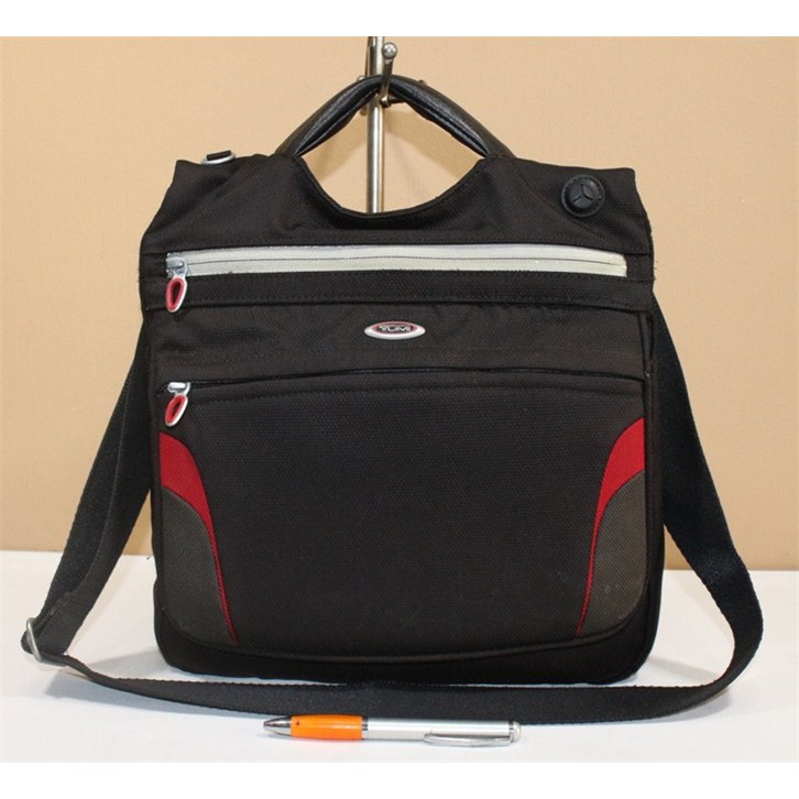 tumi tech sling bag