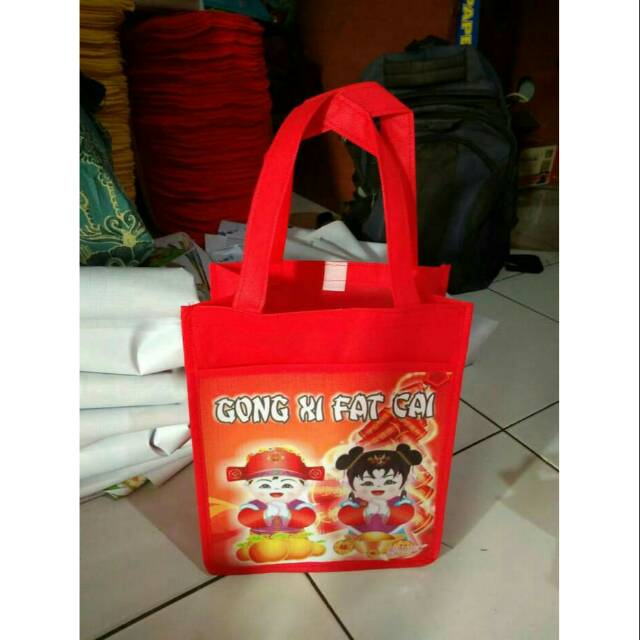 

Tas souvenir imlek model kantong