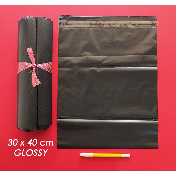 

Polymailer Kantong Plastik Amplop Packing Online GLOSSY PREMIUM 30x40 ±100