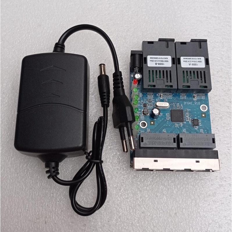 Media Converter 2FO 4LAN 10/100 / 2sc 4rj45 + Adaptor TANPA CASING