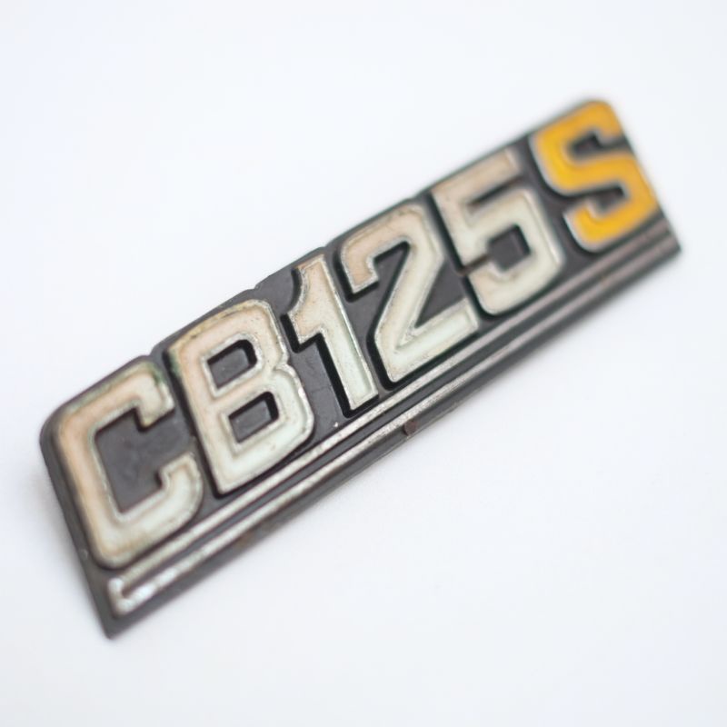 EMBLEM LOGO KEMPOL TEMPONG TUTUP AKI SIDE BOX COVER ACCU HONDA CB125 CB 125 CB125S NOS