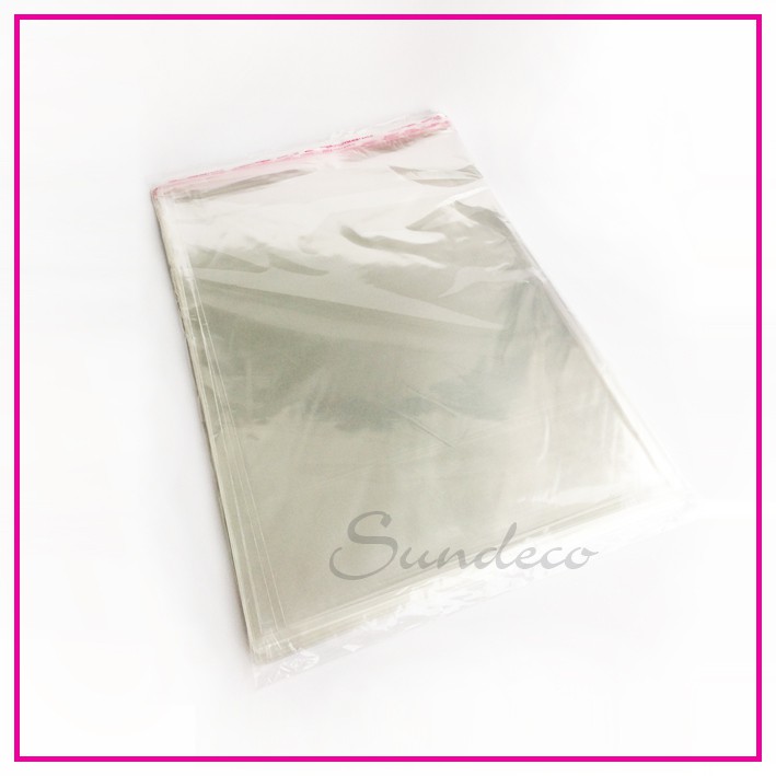 

Plastik OPP Bening Kemasan Baju Plastik Seal Lem Ukuran 30 x 37 cm