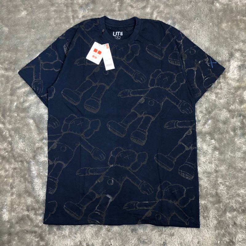 TSHIRT KAOS BAJU UNIQLO X KAWS FULL PRINT NAVY LIKE ORI