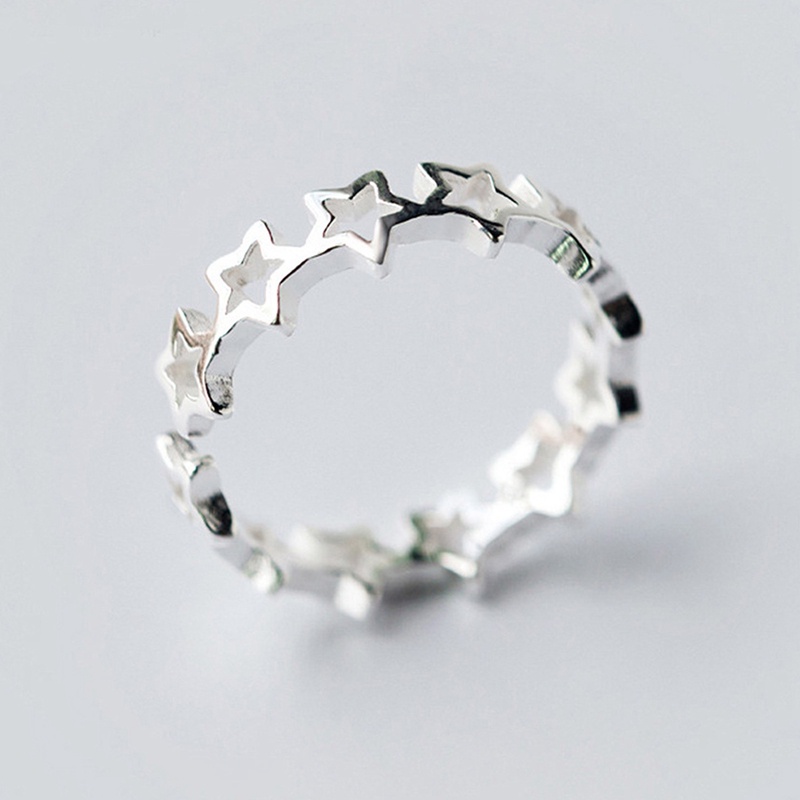 Cincin Model Terbuka Desain Bintang Hollow Out Warna Silver Gaya Minimalis Untuk Wanita