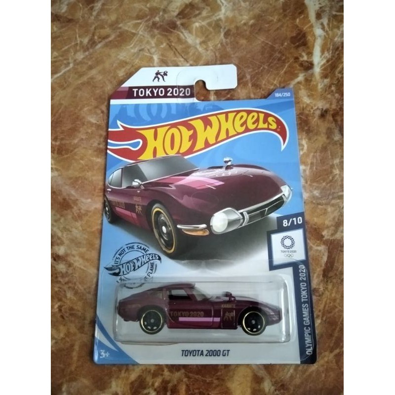 Hot Wheels Toyota 2000 GT Merah Olympic Games Tokyo 2020 Mobil mobilan mainan anak