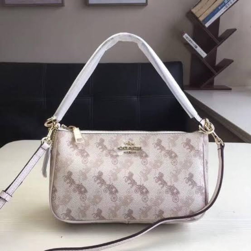 Coach Top Handle Pouch in white horse