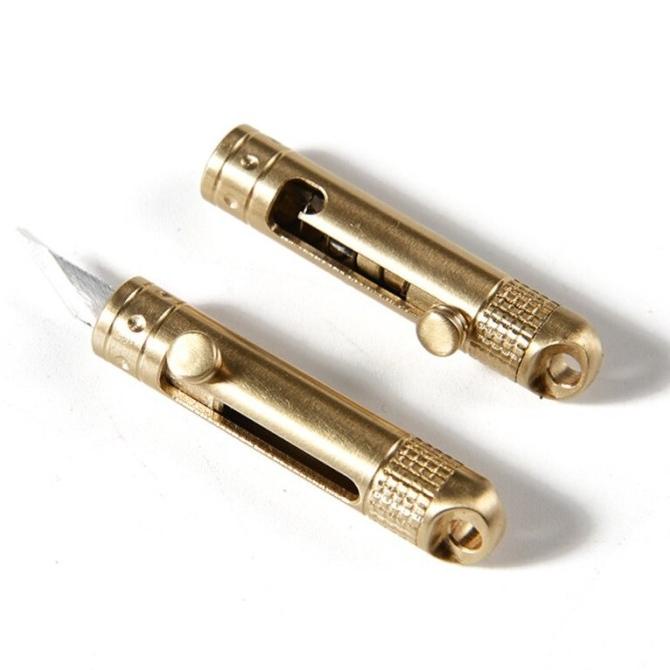 

Tegoni Pisau Cutter Mini Lipat Model Gantungan Kunci Pembuka Paket Dus