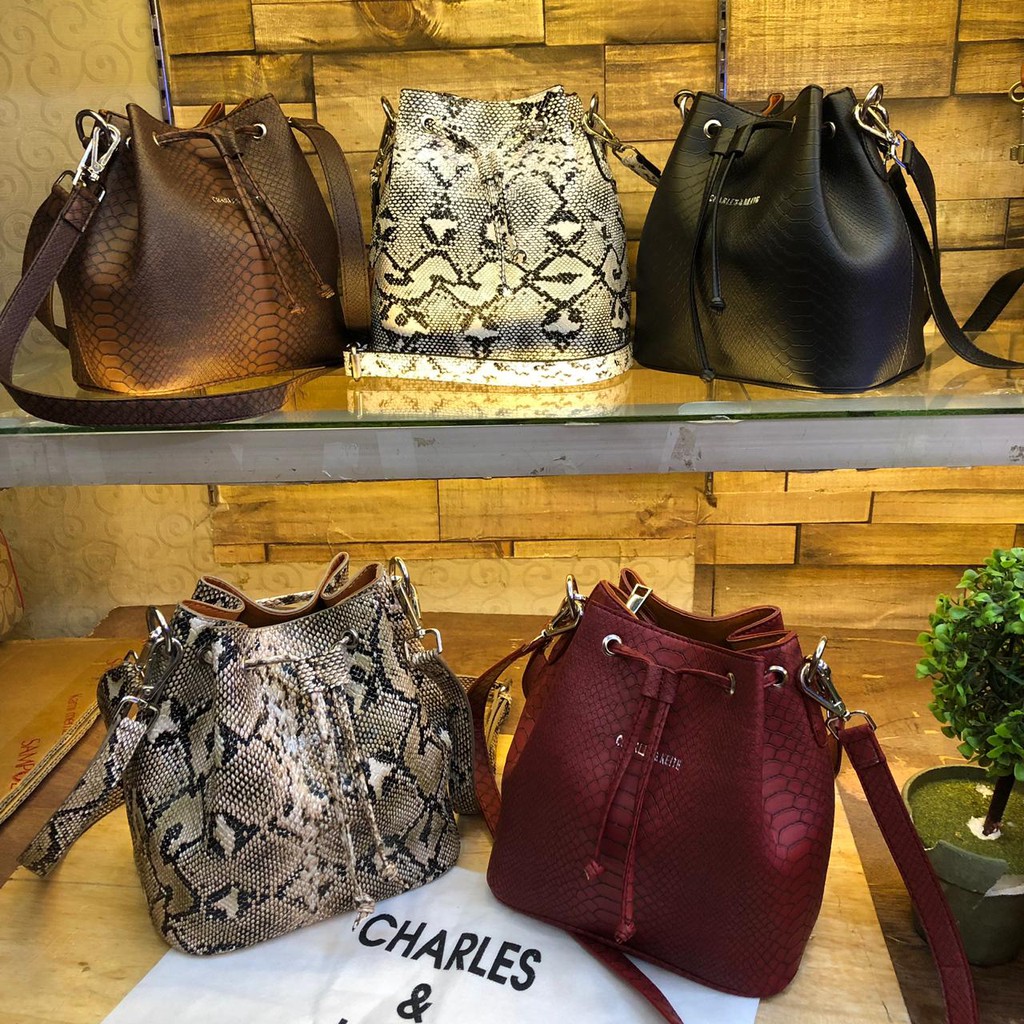 TAS SERUT SNAKE CHARLES & KEITH