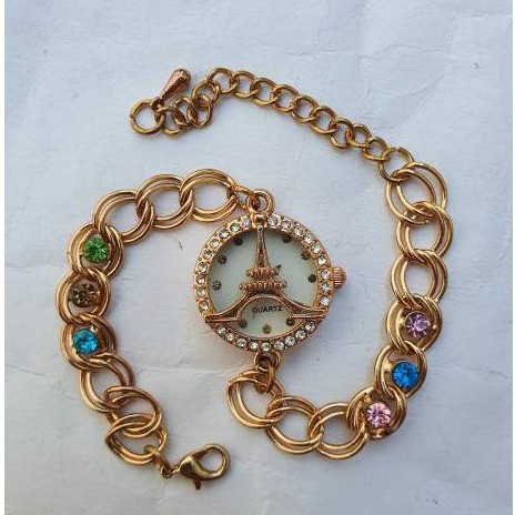 Jam tangan wanita gelang emas gambar Paris Terbaru
