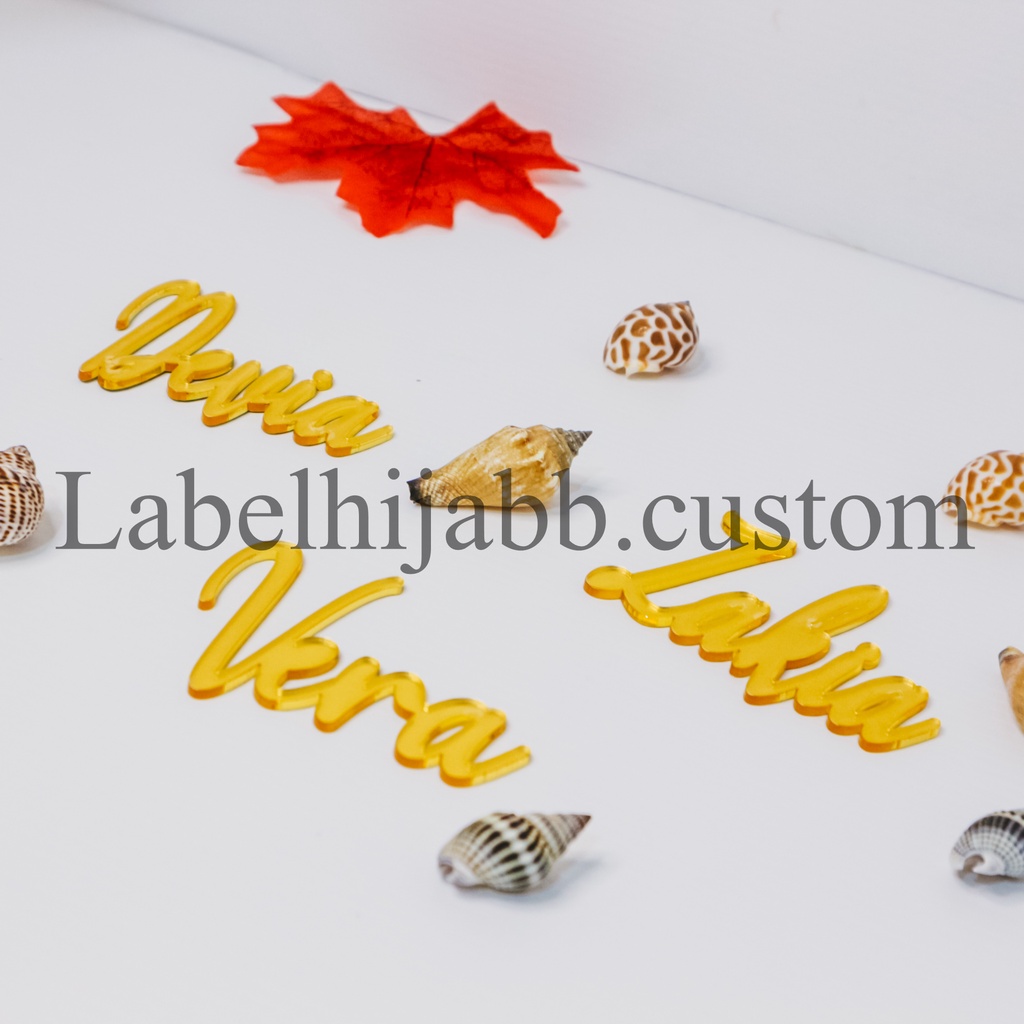 

label hijab | label baju | label akrilik | custom label | label jilbab | label cutting | label Nama