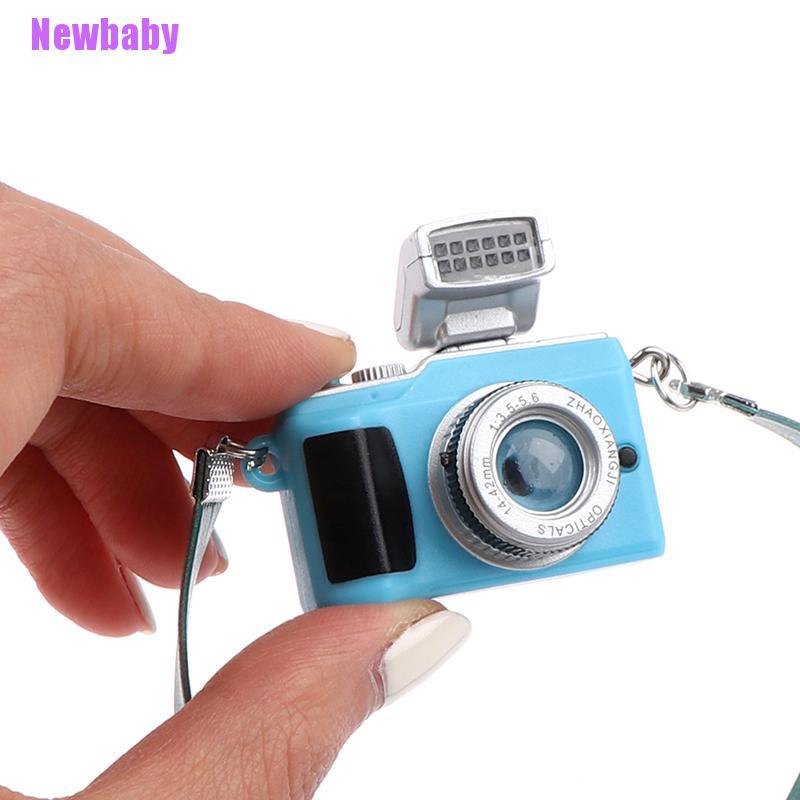 (Newbaby) Miniatur Kamera SLR Skala 1: 12 Untuk Aksesoris Rumah Boneka