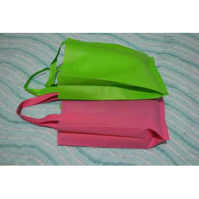 

Tas Goodiebag Spunbond Model Lipat Samping 30x40 cm
