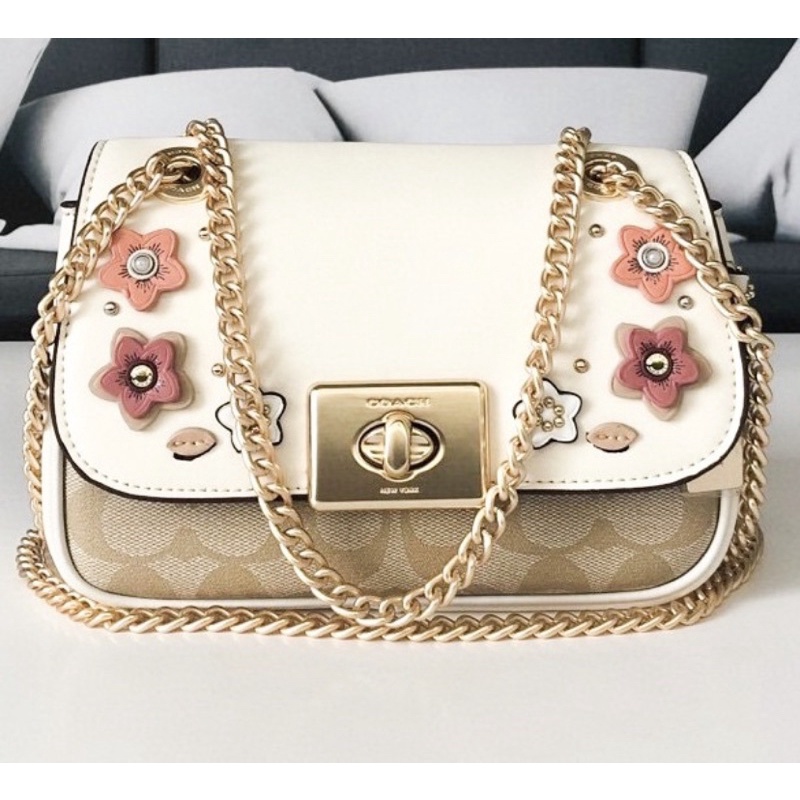 MINI CASSIDY CROSSBODY IN SIGNATURE CANVAS WITH FLORAL APPLIQUE  (COACH F73057)