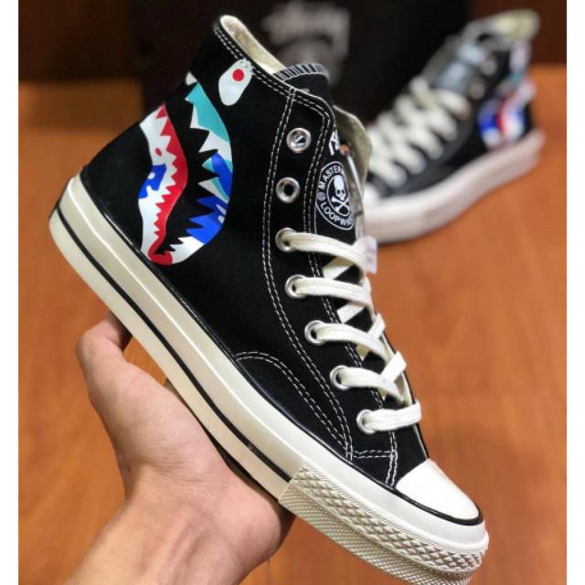 harga converse x kaws