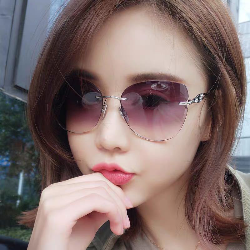Kacamata Hitam Model Mata Kucing Rimless Perlindungan UV400 Untuk Wanita