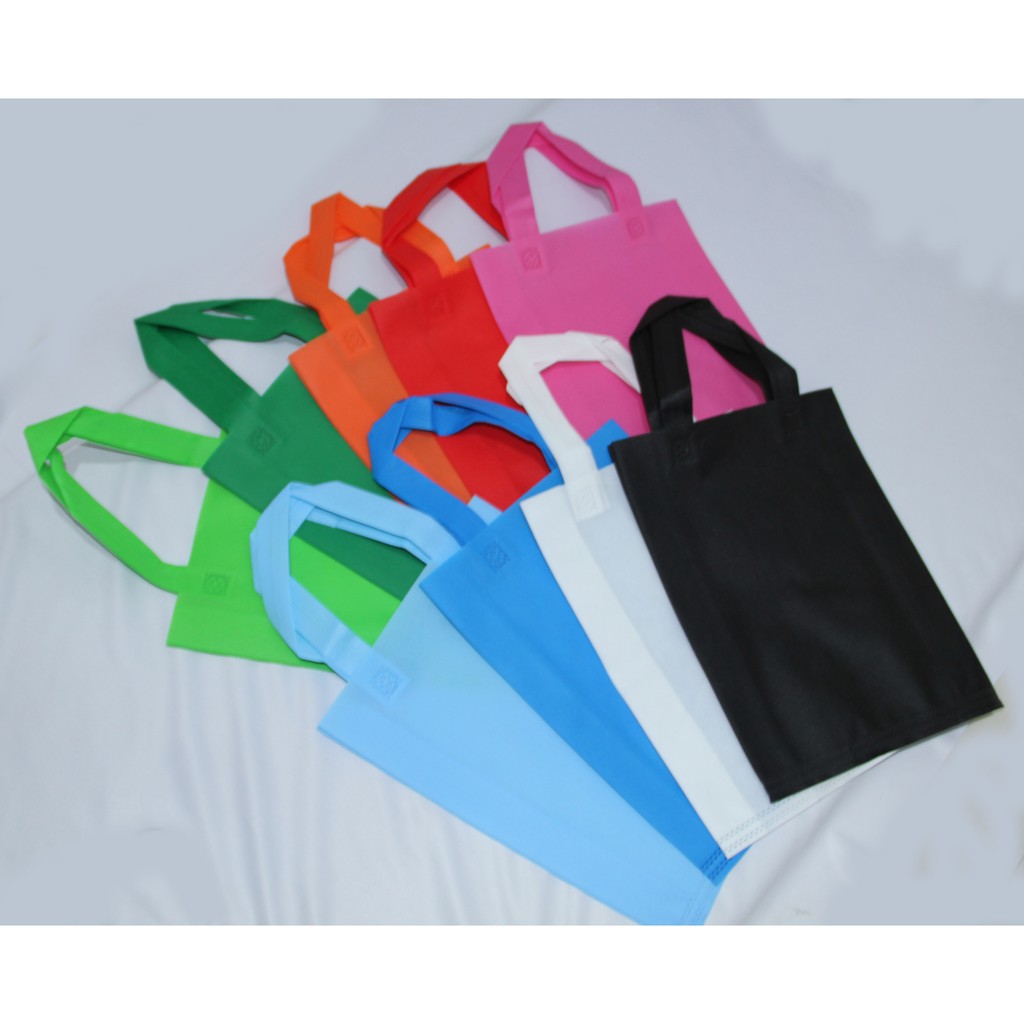 

Goodiebag Tas Press Handle / Tali 30 x 40 x 8