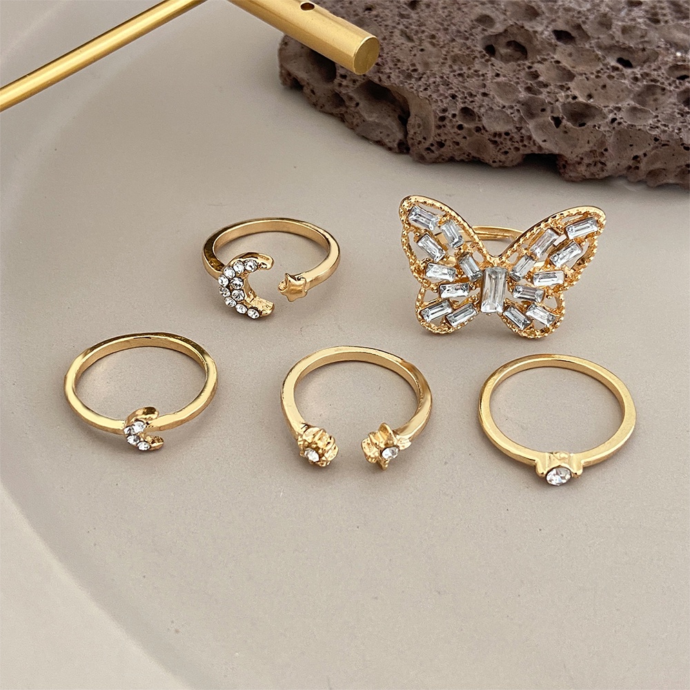 5pcs / Set Cincin Adjustable Desain Kupu-Kupu Bulan Bintang Aksen Kristal Warna Emas Untuk Wanita