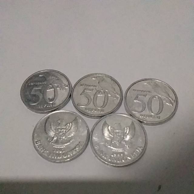 Uang koin 50 kinclong