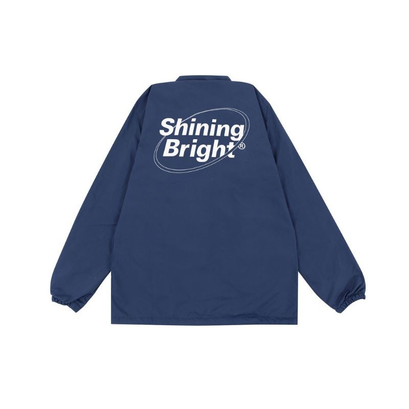 coach jaket parasut keren kekinian shining bright logo varian warna navy blue full waterproof