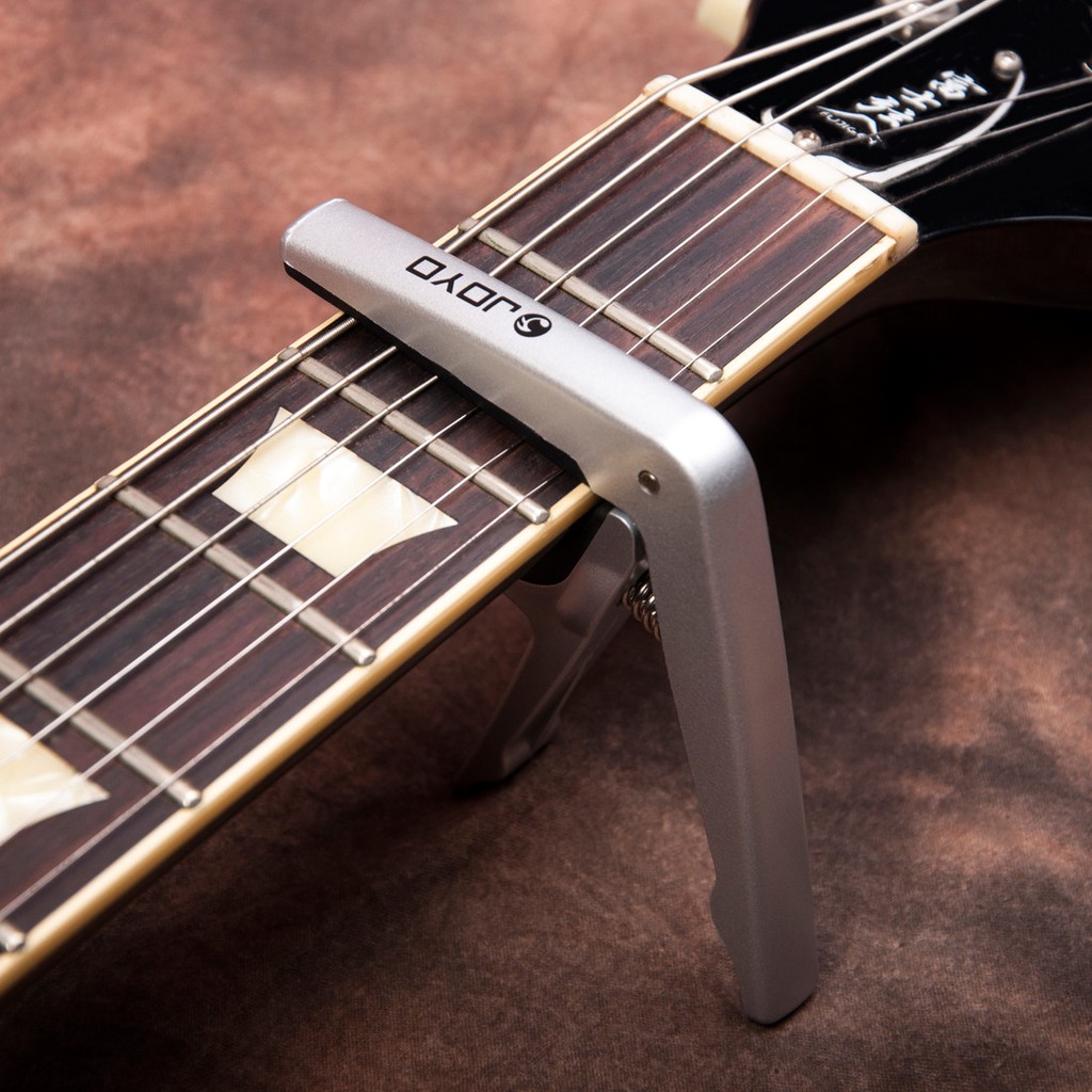 Capo Bahan Plastik Untuk 6 Senar Gitar Dengan Pick