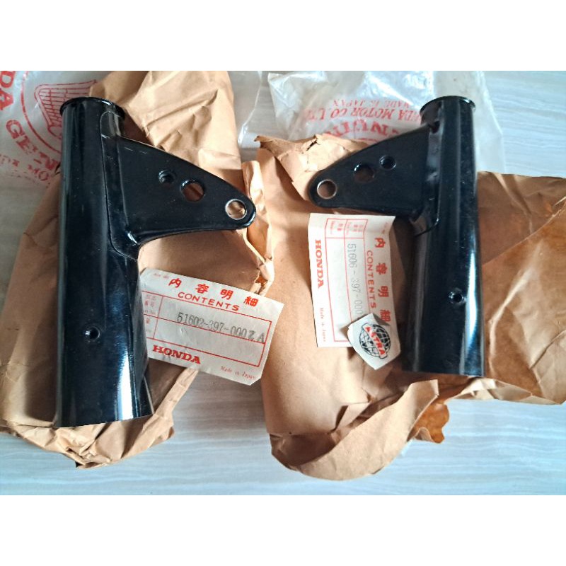 kupingan kuping lampu cg110 cg125 cb125 original baru