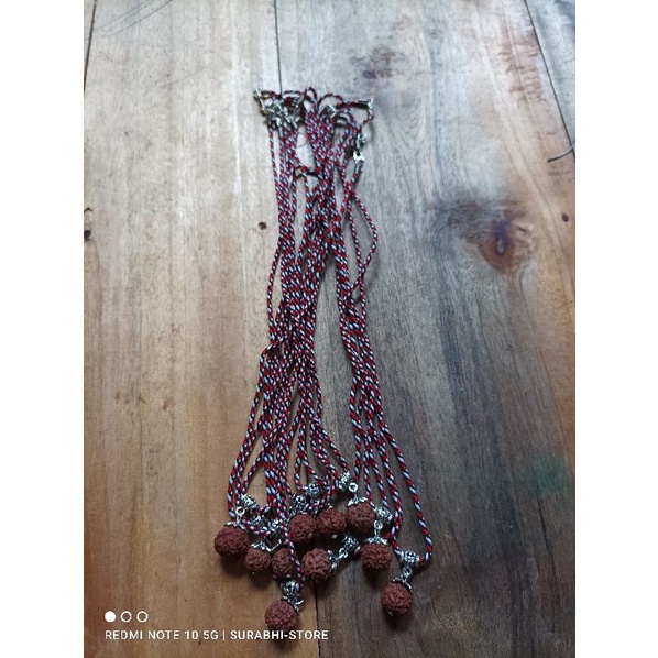 Kalung benang tridatu plus liontin rudraksha