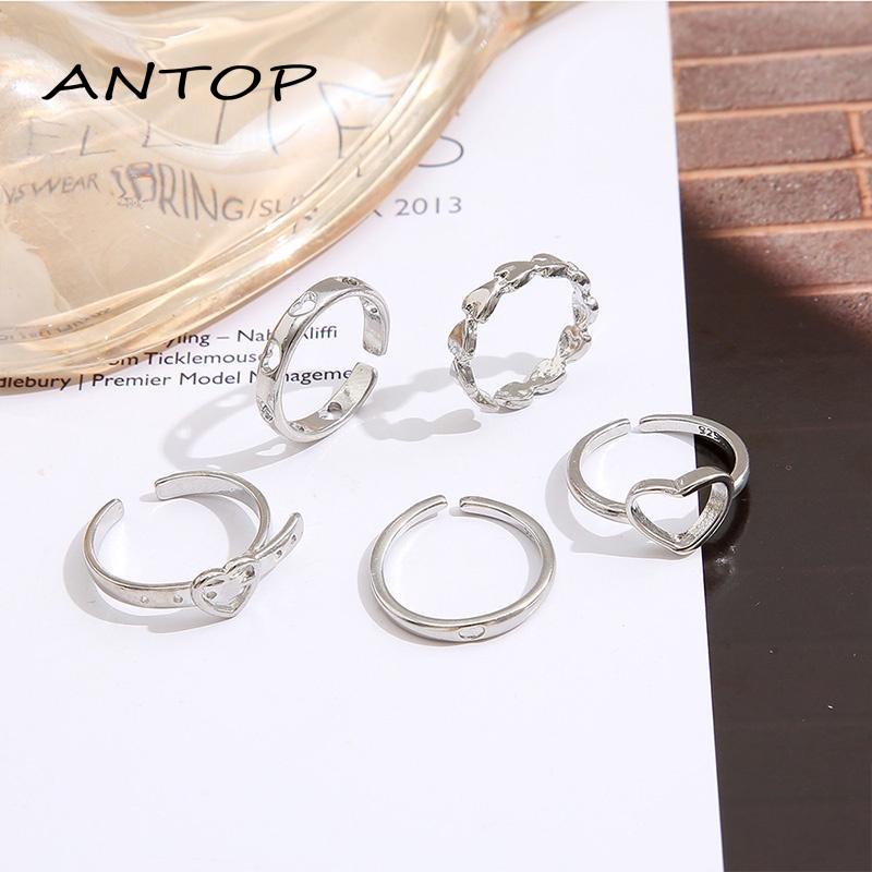 Set Perhiasan Cincin Bentuk Kupu-Kupu Dan Hati Aksen Mutiara Gaya Punk Warna Emas Dan Silver