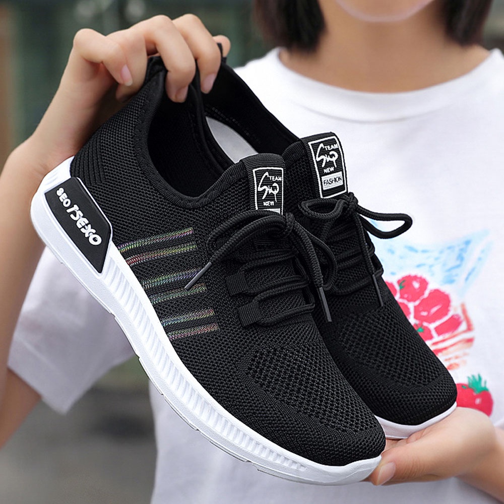 Sepatu wanita sneakers 2022 Sepatu olahraga rajutan terbang sports shoes Bahan Full Karet Anti Licin