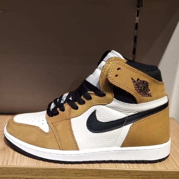 light brown and white jordans