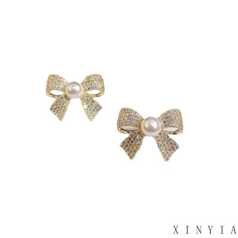 Xia.id Anting Tusuk Gantung Desain Pita Hias Mutiara Gaya Trendy / Simple Untuk Wanita