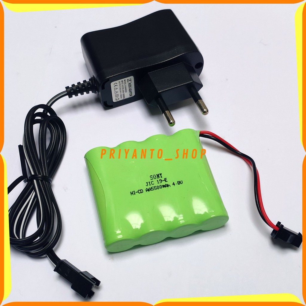 Paket Baterai dan Charger RC AA 5500mAh 4.8V isi 4 Soket Hitam