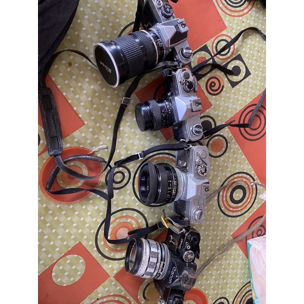 camera shooting panasonic M3500,tripod excell,camera analog nikon FM 3072867, camera analog fujica S