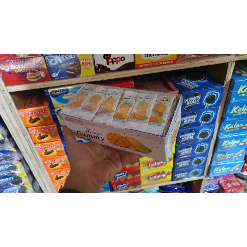 

Gummy Mango permen kenyal yupi rasa mangga 8 gr per box isi 60 pcs