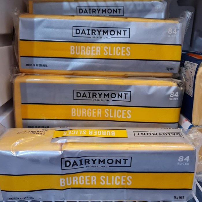 

Orange cheedar slice colour Dairymont halal gojek