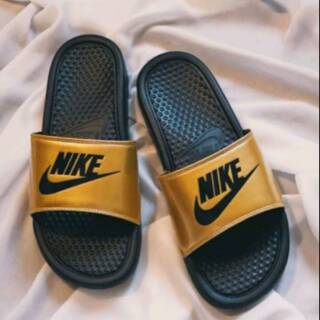 nike slippers gold