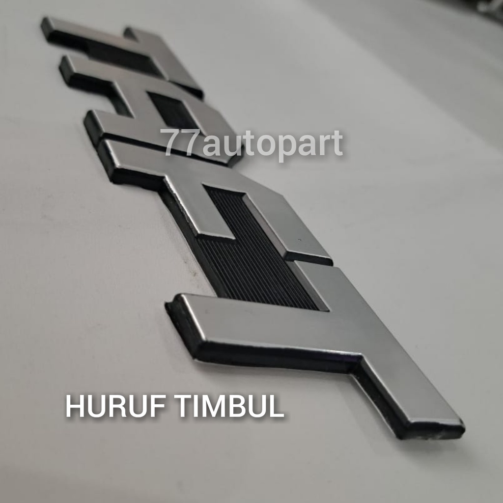 emblem logo mobil tulisan taft besar miring