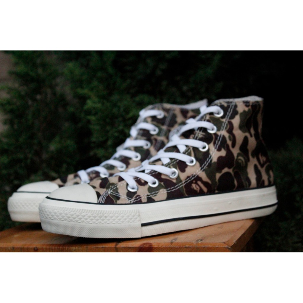 army green chuck taylors